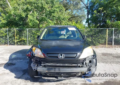 2009 Honda Cr-V Lx z USA, uszkodzony, nr VIN 3CZRE38379G700903